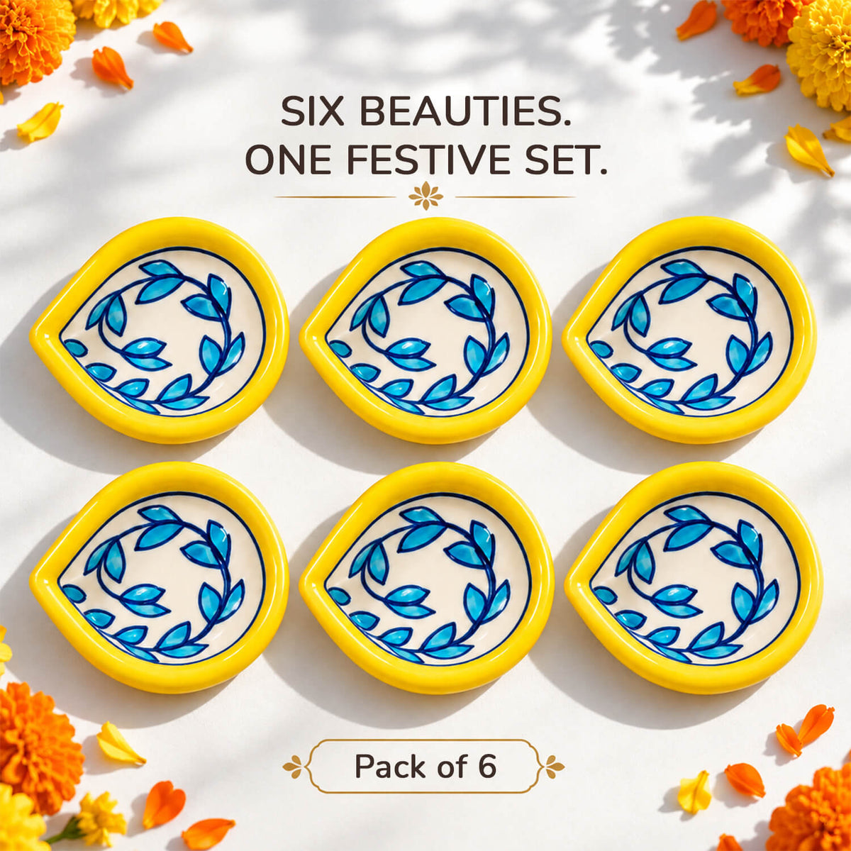 Colorful decorative pottery diyas closeup showing detailed hand-painted patterns