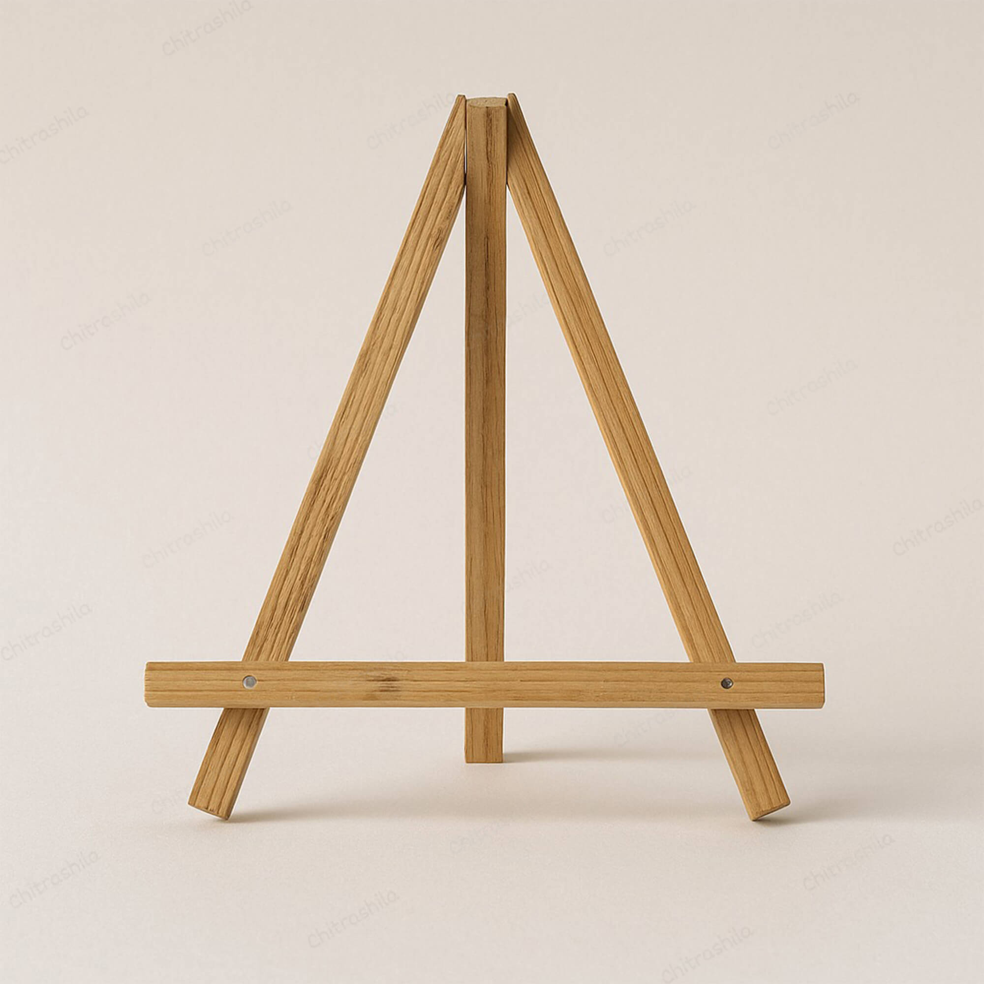 Wooden easel on a beige background