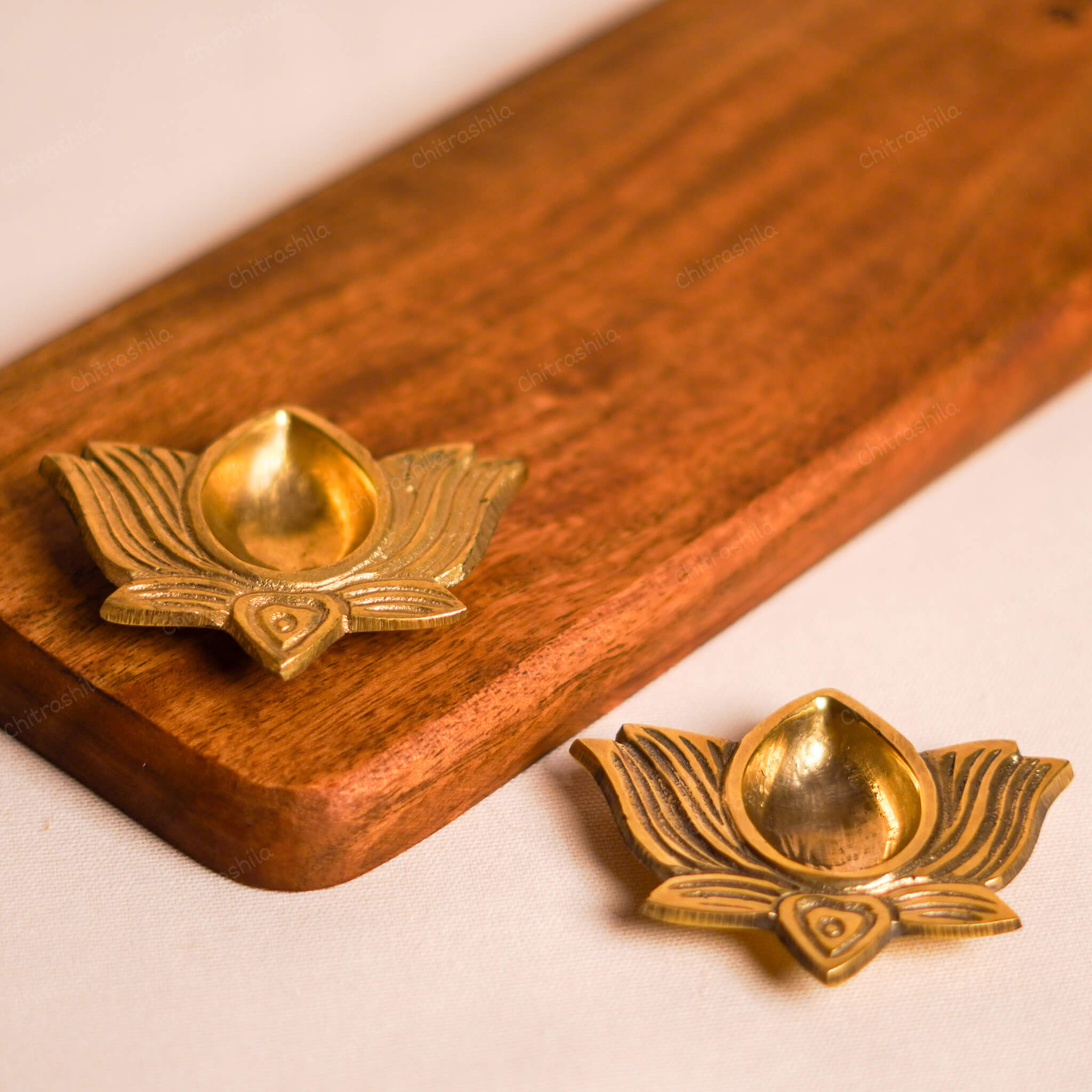 brass lotus diya
